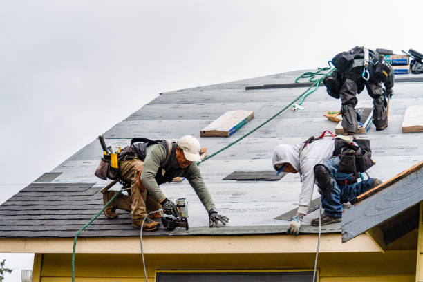 Professional Storm Damage Roof Repair technician working in West Hills, NY